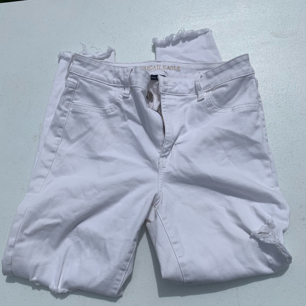 White American Eagle distressed skinny jeans